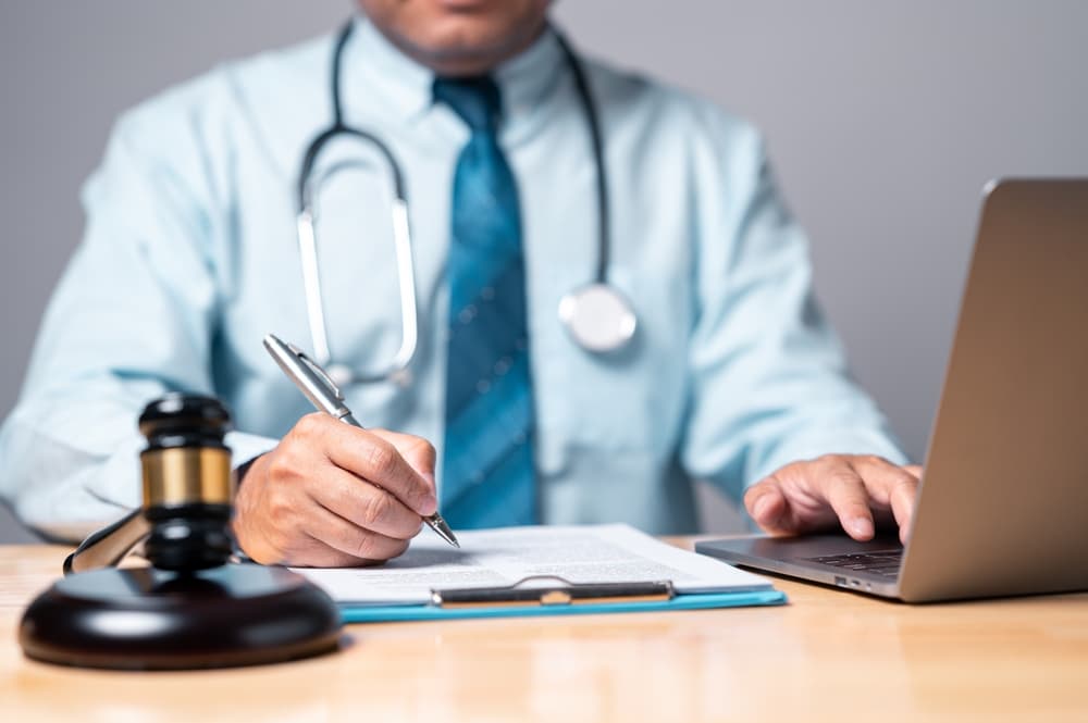 Personal Injury lawyer wields legal authority, balancing medicine and justice