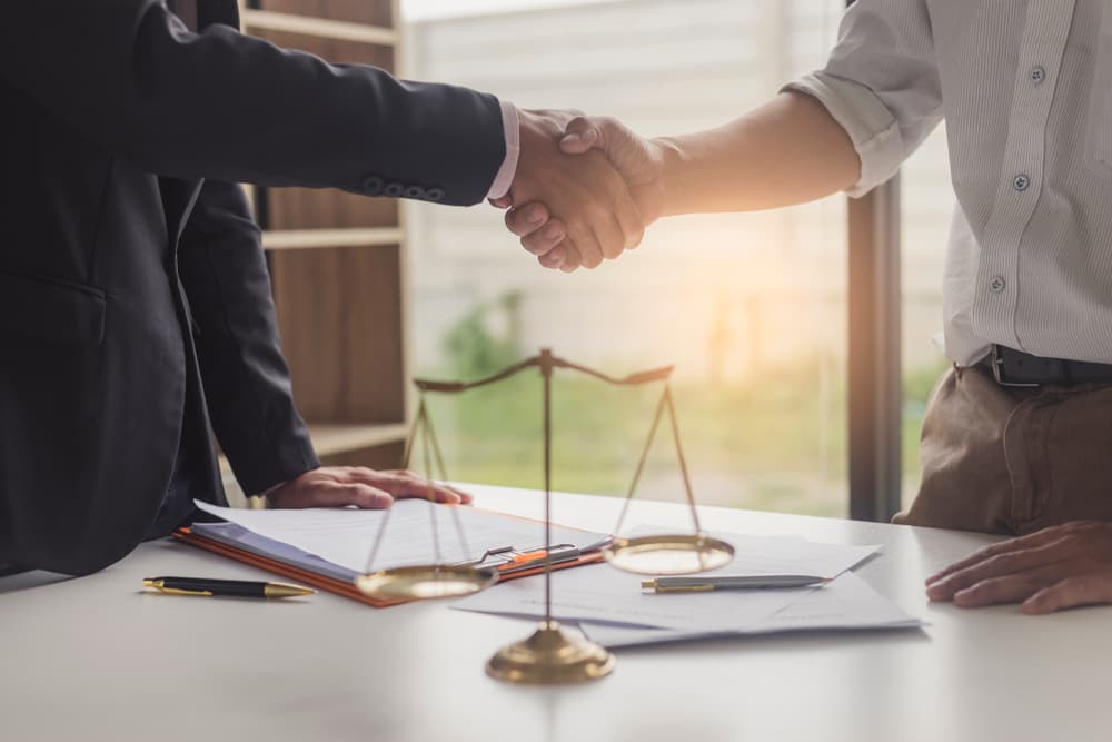 Lawyer and client after free case evaluation